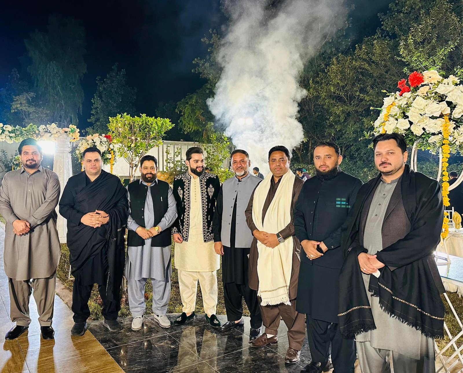 Ibraheem Awan with a team member